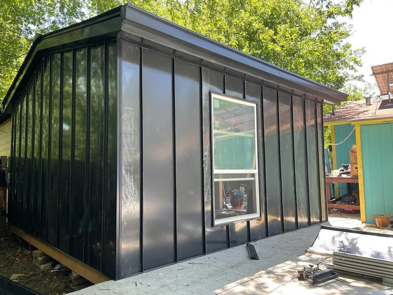 Black standing seam metal wall panels for Roof Inspection in Nephi